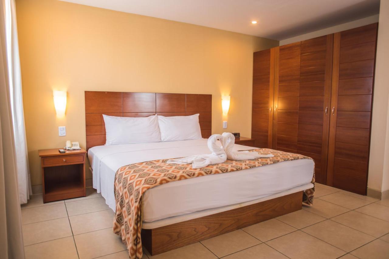 فندق ويندهام كوستا ديل سول بوكالبا المظهر الخارجي الصورة A bedroom at the hotel